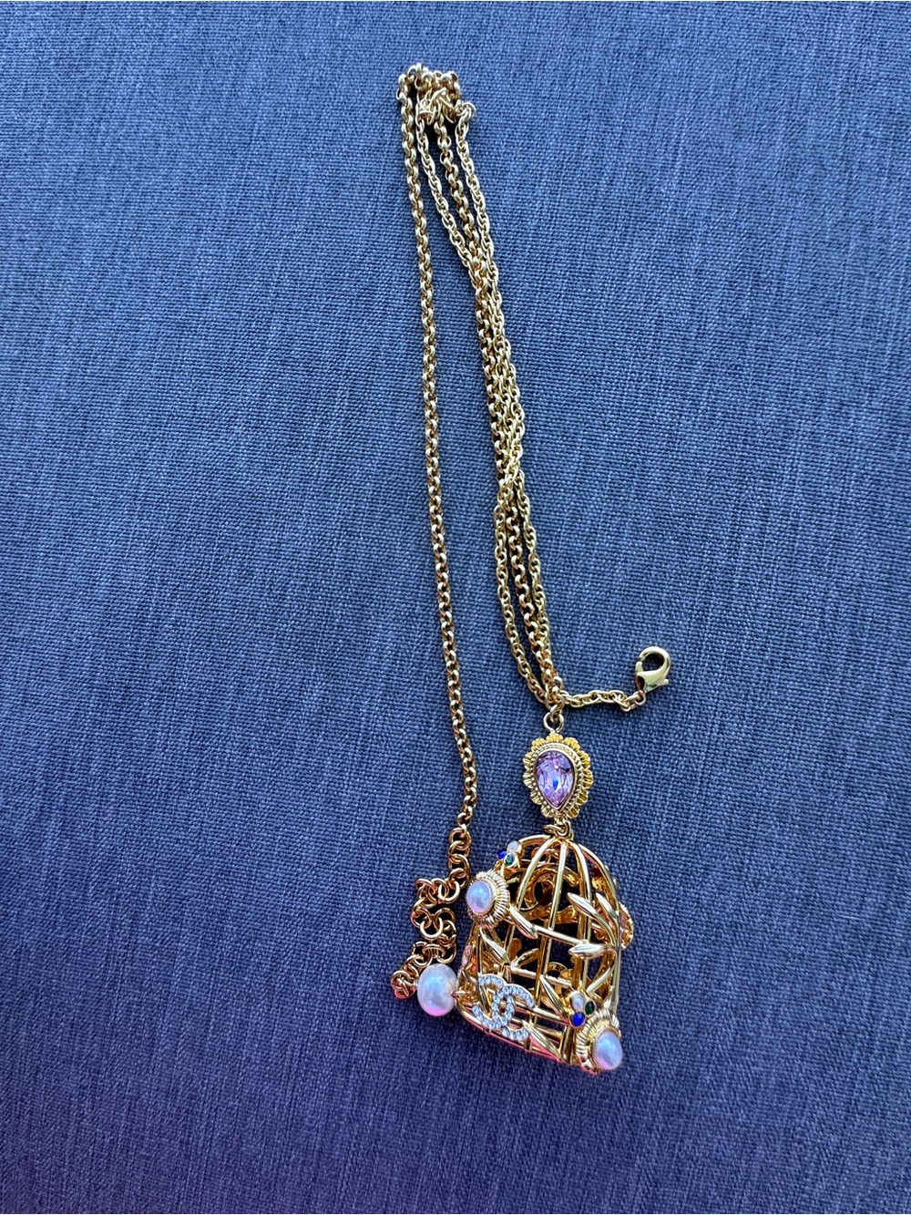 Luxury Gold Birdcage Pendant Necklace with Iridescent Accents